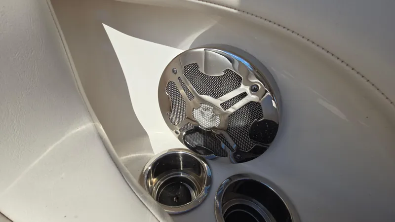 Slide: The Image of Speaker and cup holders on 2018 Chaparral 224 Sunesta boat interior. - 37