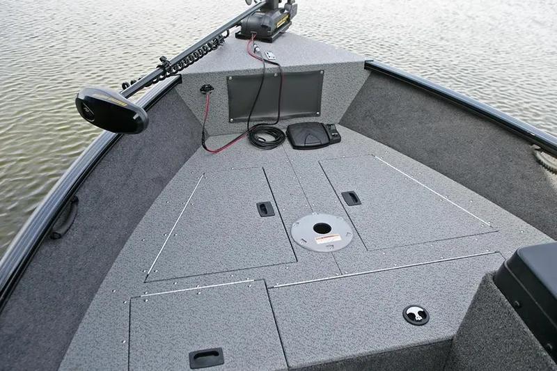 Slide: The Image of Manufacturer Provided Image: 2023 Lund 1650 Rebel XL SS boat interior with fishing deck and storage compartments. - 21