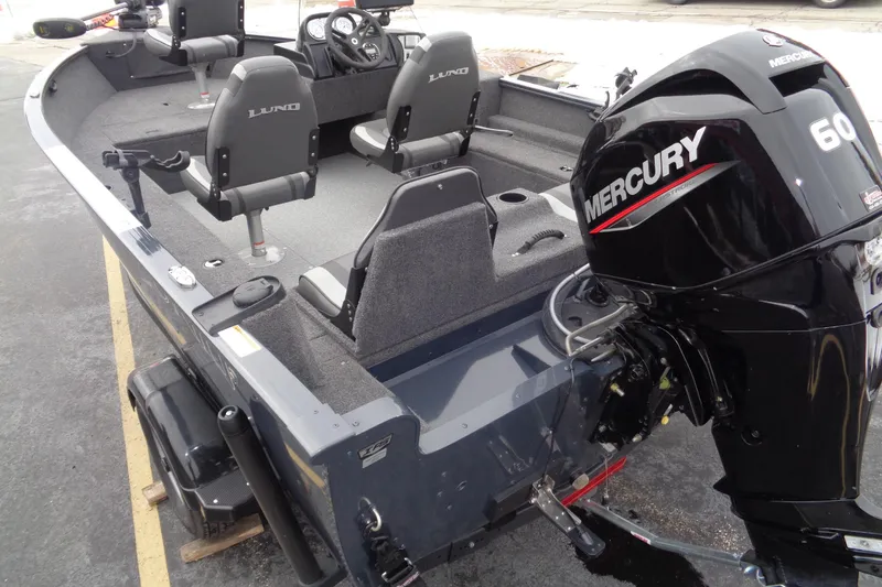 Slide: The Image of 2023 Lund 1650 Rebel XL SS boat with Mercury 60 engine, interior view. - 5