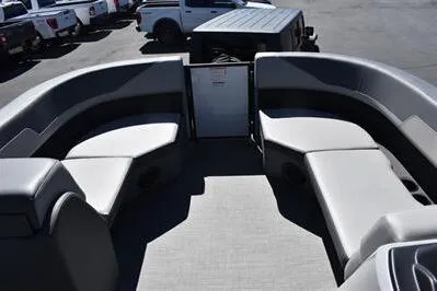 Slide: The Image of 2025 Lowe LS 170 boat interior with gray seating and spacious layout. - 14