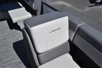 Slide: The Image of 2025 Lowe LS 170 boat seat with gray and white upholstery. - 17