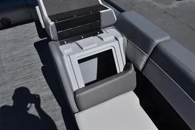 Slide: The Image of 2025 Lowe LS 170 boat interior with gray seating and storage compartment. - 18
