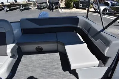 Slide: The Image of 2025 Lowe LS 170 boat interior with gray seating and modern design. - 21