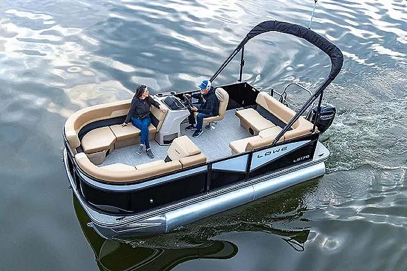 Slide: The Image of Manufacturer Provided Image: 2025 Lowe LS 170 pontoon boat on water with two passengers. - 31