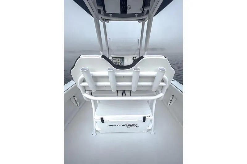 Slide: The Image of Interior view of 2026 Stingray 236 CC boat with seating and rod holders. - 6