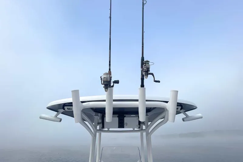 Slide: The Image of Fishing rods on a 2026 Stingray 236 CC boat. - 7