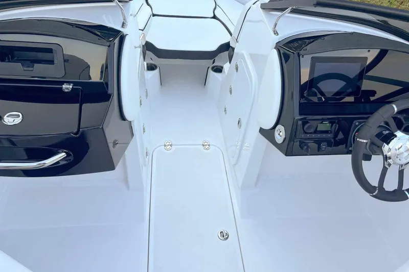 Slide: The Image of Interior of 2026 Stingray 23 OSX boat, modern design. - 5
