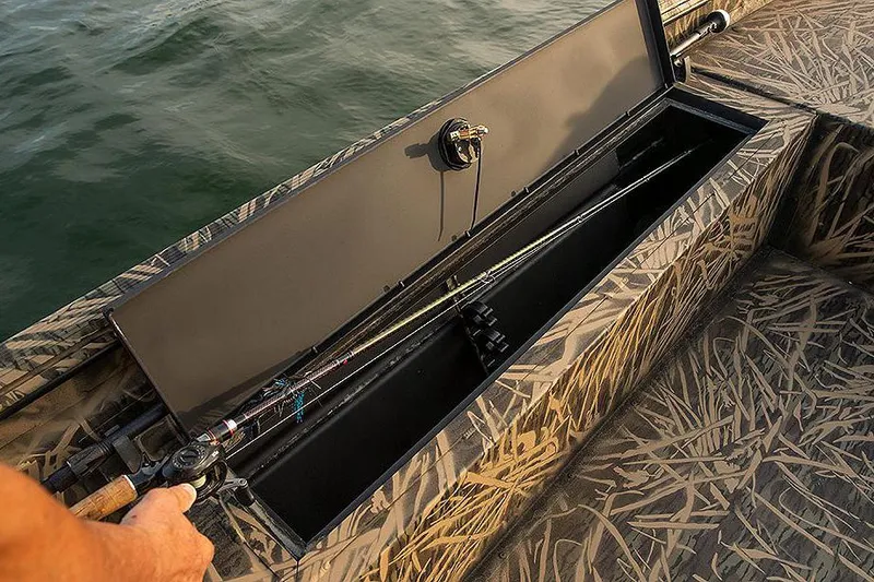 Slide: The Image of Manufacturer Provided Image: Lowe Roughneck 1860 boat storage compartment with fishing rods, 2025 model. - 20