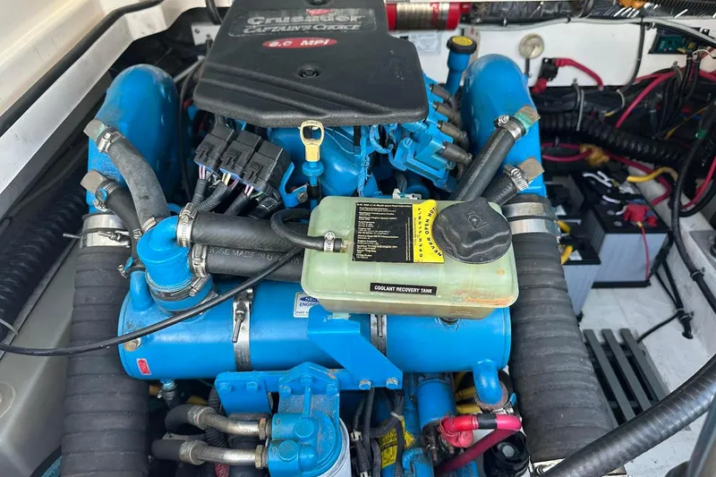 Slide: The Image of Engine compartment of a 2005 Tiara 2900 Open boat, featuring a Crusader Captain's Choice engine. - 18