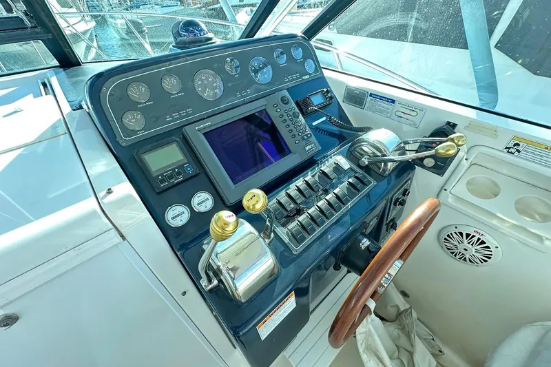 Slide: The Image of Helm of 2005 Tiara 2900 Open boat with navigation controls and gauges. - 4