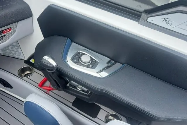 Slide: The Image of 2022 Nautique Super Air Nautique G21 boat control panel with sleek design and modern features. - 15