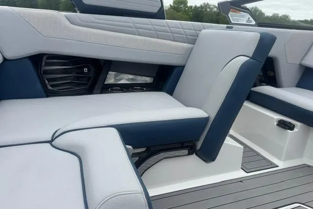 Slide: The Image of Interior seating of 2022 Nautique Super Air Nautique G21 boat, featuring modern design and upholstery. - 19