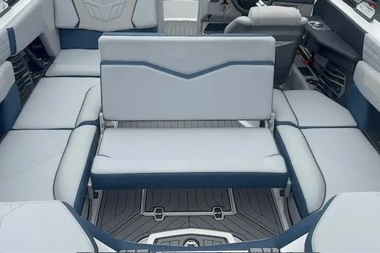 Slide: The Image of 2022 Nautique Super Air Nautique G21 interior with luxurious seating and modern design. - 20