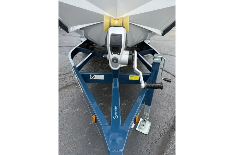 Slide: The Image of 2022 Nautique Super Air Nautique G21 boat on trailer, front view. - 24