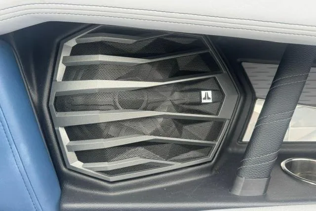 Slide: The Image of Speaker grille in 2022 Nautique Super Air Nautique G21 boat interior. - 28