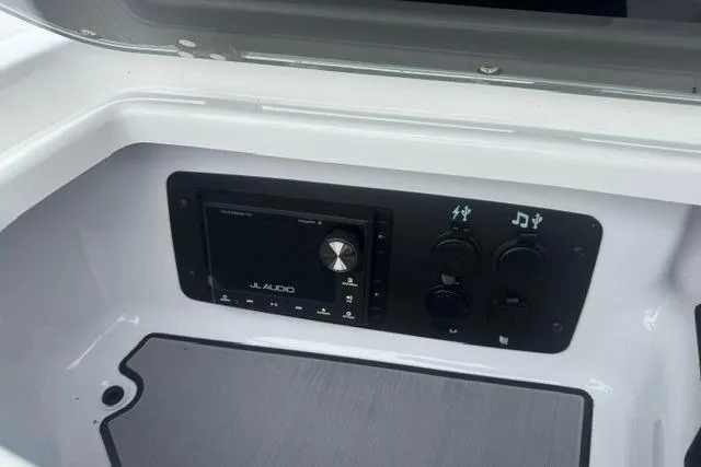 Slide: The Image of 2022 Nautique Super Air Nautique G21 audio control panel with JL Audio system. - 34