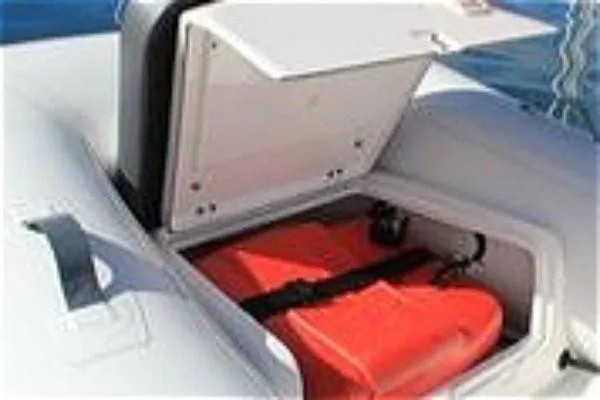 Slide: The Image of 2023 Walker Bay 365 STX boat storage compartment with red fuel tank. - 12