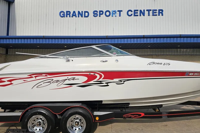 Slide: The Image of 2004 Baja 275 boat at Grand Sport Center, featuring sleek design and vibrant graphics. - 3
