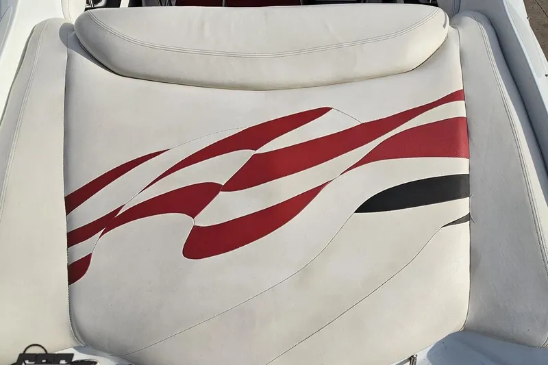 Slide: The Image of White and red seat design in a 2004 Baja 275 boat. - 36