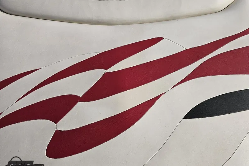 Slide: The Image of Red and white leather upholstery design on 2004 Baja 275 boat seat. - 37