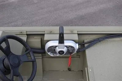 Slide: The Image of 2025 Lowe Roughneck 1860 Rambler boat steering console with control panel and wheel. - 14