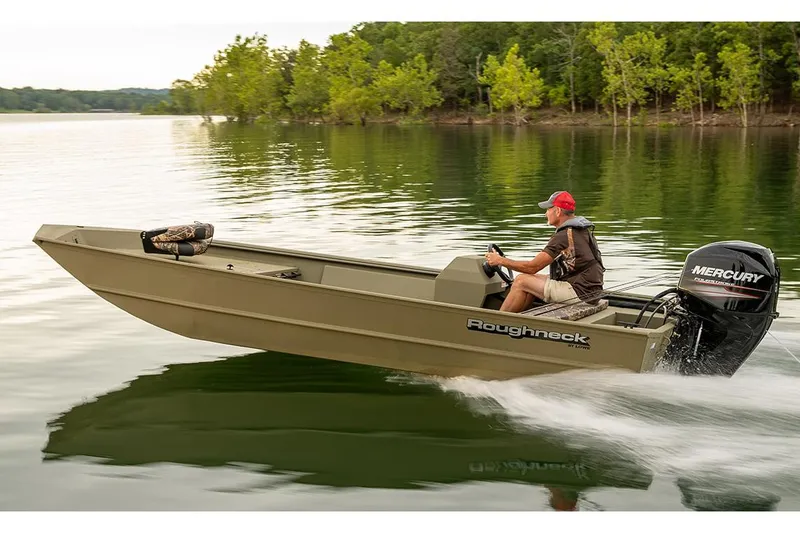Slide: The Image of Manufacturer Provided Image: 2025 Lowe Roughneck 1860 Rambler boat cruising on a serene lake. - 18