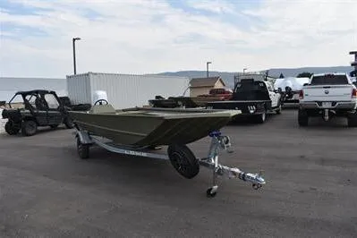 Slide: The Image of 2025 Lowe Roughneck 1860 Rambler boat on trailer in parking lot. - 3