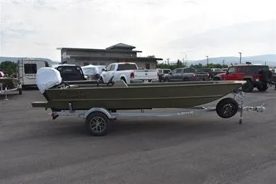 Slide: The Image of 2025 Lowe Roughneck 1860 Rambler boat on trailer in parking lot. - 4