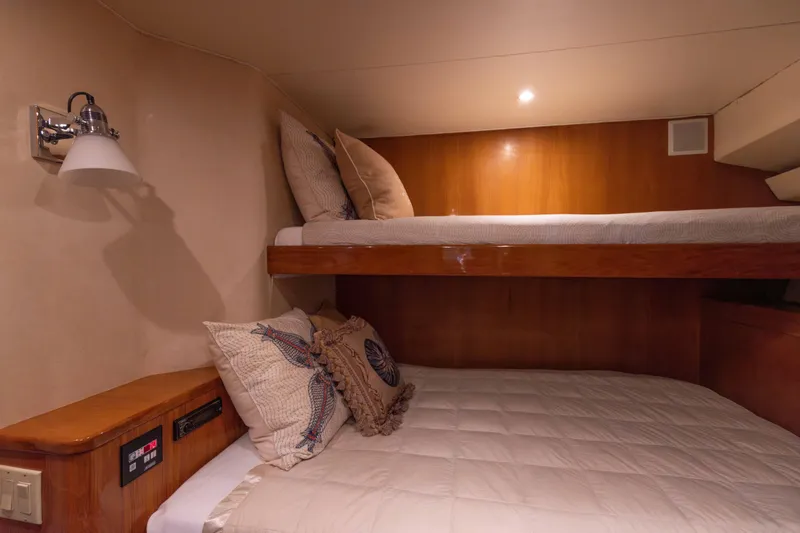 Slide: The Image of Cozy cabin interior with bunk beds in 1988 Donzi R65 Convertible yacht. - 17