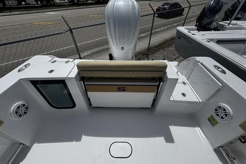 Slide: The Image of 2026 Sportsman Open 232 Center Console boat interior with seating and storage. - 21
