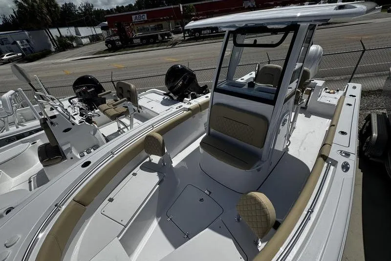 Slide: The Image of 2026 Sportsman Open 232 Center Console boat with seating and console view. - 8