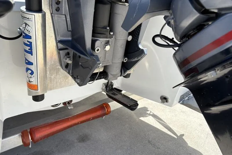 Slide: The Image of Close-up of 2022 East Cape Vantage boat motor and Atlas hydraulic jack plate. - 15