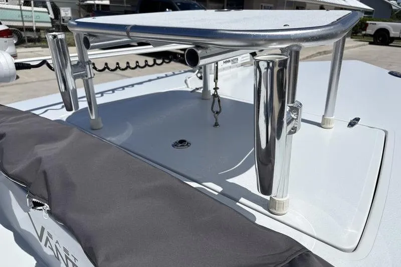 Slide: The Image of 2022 East Cape Vantage boat deck with stainless steel fittings and covered storage. - 18