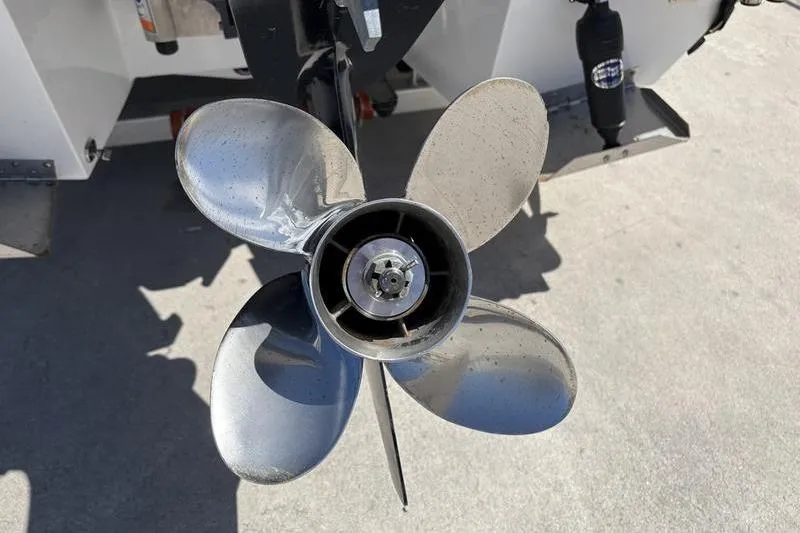 Slide: The Image of 2022 East Cape Vantage boat propeller close-up on concrete surface. - 5
