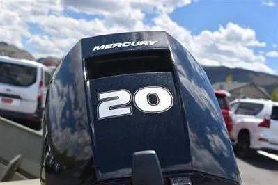 Slide: The Image of 2024 Lowe L1448 Jon boat with Mercury 20 horsepower outboard motor. - 7