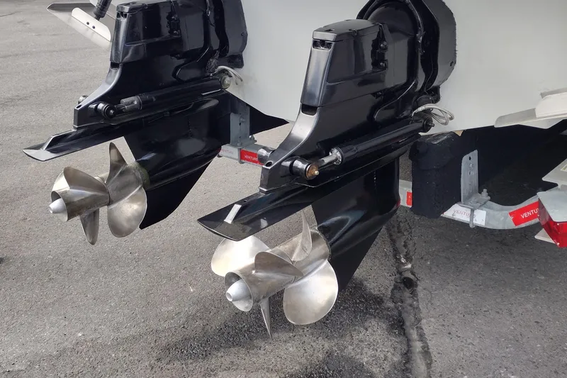 Slide: The Image of Twin propellers of a 2005 Formula 330 Sun Sport boat on a trailer. - 10