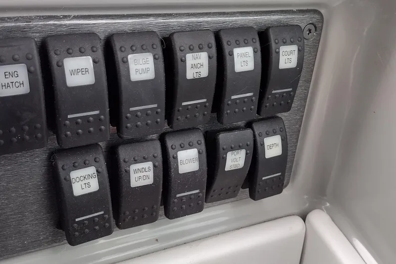 Slide: The Image of Control panel switches on a 2005 Formula 330 Sun Sport boat. - 25