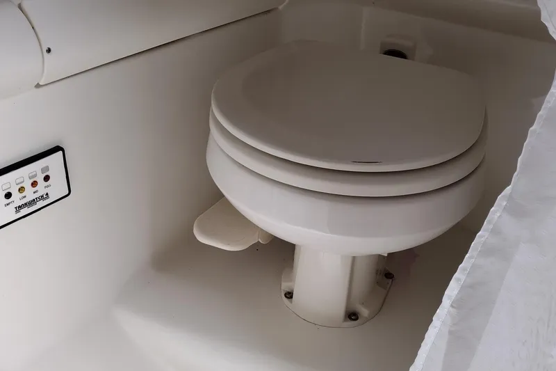 Slide: The Image of Boat toilet in a 2005 Formula 330 Sun Sport, featuring a TankWatch 4 system. - 30