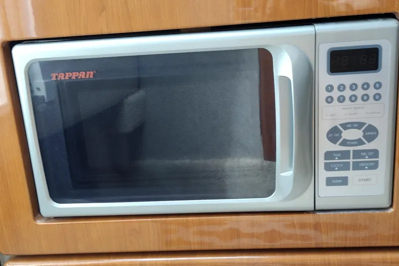 Slide: The Image of Tappan microwave oven in a 2005 Formula 330 Sun Sport boat interior. - 34