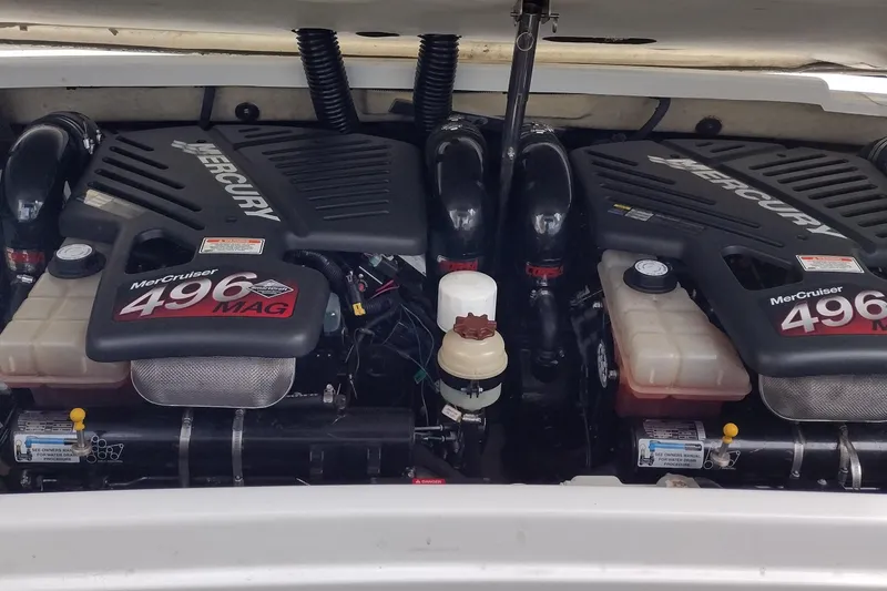 Slide: The Image of Twin MerCruiser 496 MAG engines in a 2005 Formula 330 Sun Sport boat. - 40