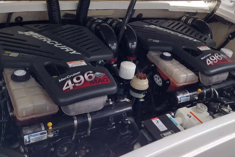 Slide: The Image of Twin MerCruiser 496 MAG engines in a 2005 Formula 330 Sun Sport boat. - 41