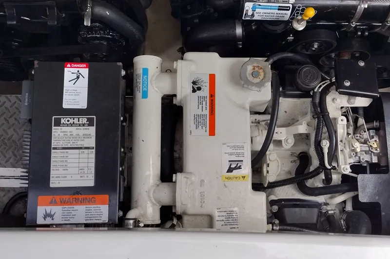 Slide: The Image of Engine compartment of a 2005 Formula 330 Sun Sport with Kohler generator. - 42