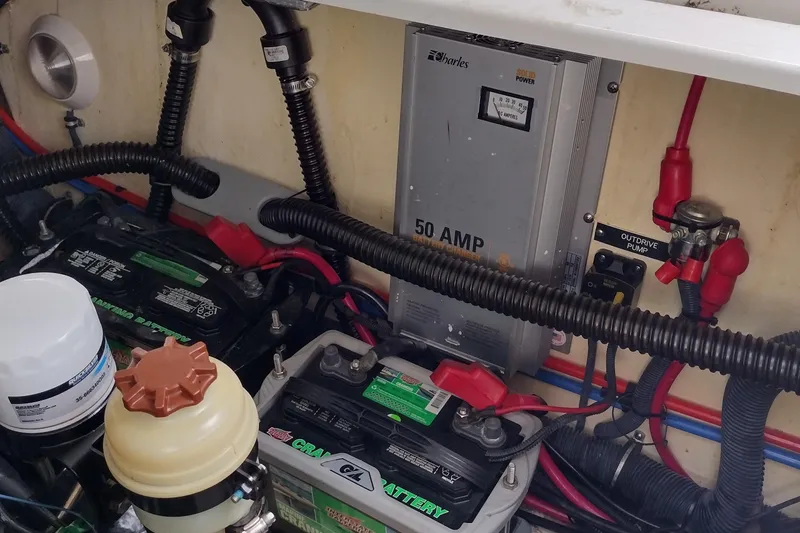Slide: The Image of Electrical system of a 2005 Formula 330 Sun Sport boat, featuring batteries and wiring. - 44