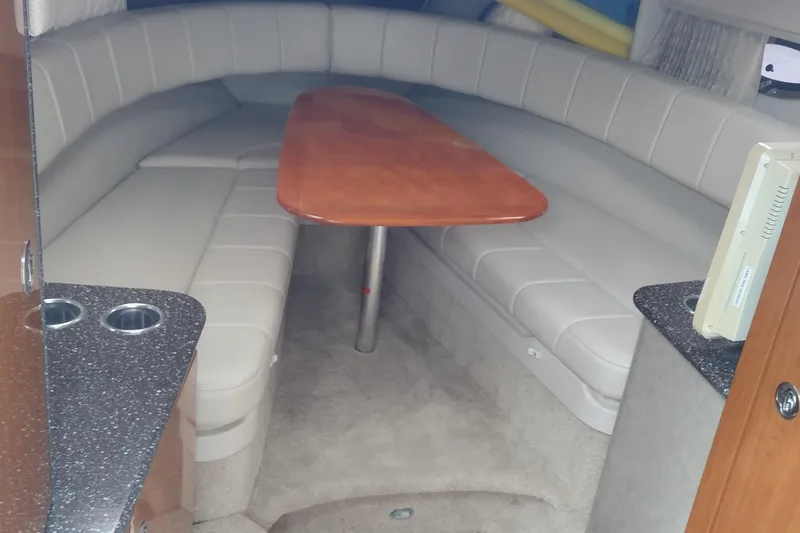 Slide: The Image of Interior of 2005 Formula 330 Sun Sport boat with seating and table. - 50