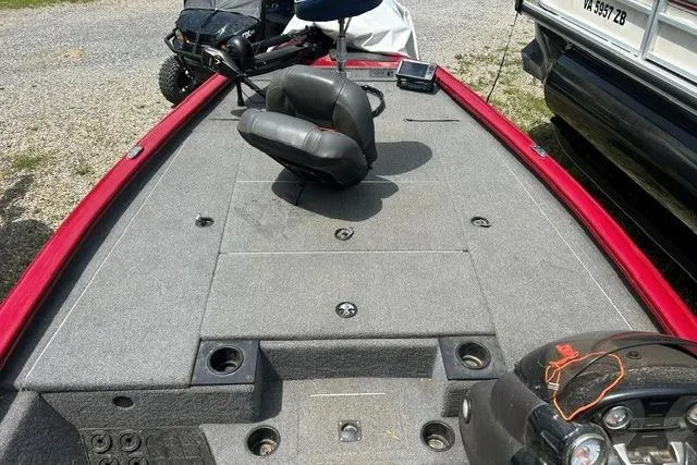 Slide: The Image of 2023 Tracker Pro Team 195 TXW Tournament Edition boat interior with seating and controls. - 5