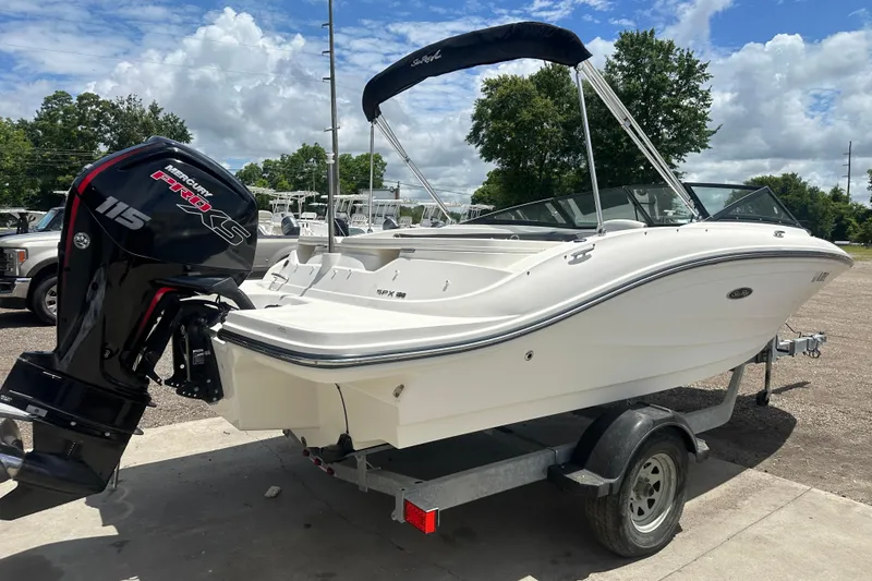 Slide: The Image of 2017 Sea Ray SPX 190 Outboard boat with Mercury 115 Pro XS engine on trailer. - 1