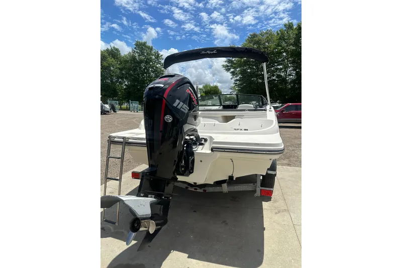 Slide: The Image of 2017 Sea Ray SPX 190 Outboard boat with powerful engine, parked outdoors. - 12