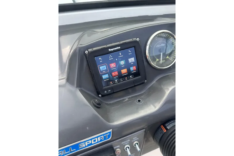 Slide: The Image of Control panel of 2017 Sea Ray SPX 190 Outboard with Raymarine display and speedometer. - 15