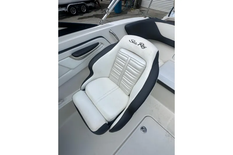 Slide: The Image of 2017 Sea Ray SPX 190 Outboard boat seat, white and black design, with logo embroidery. - 17