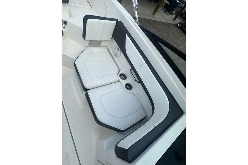 Slide: The Image of 2017 Sea Ray SPX 190 Outboard boat seating with white and black upholstery. - 18